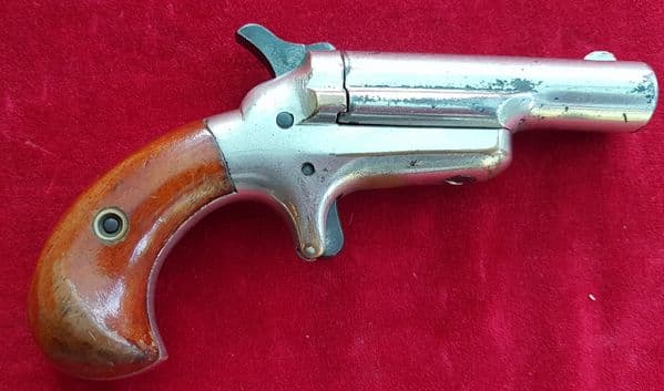 A scarce American Colt no 3. derringer pistol in obsolete .41 rim-fire calibre. Circa 1875. Ref 1536